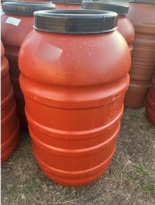 CHICKEN FEED AND WATER STORAGE DRUMS